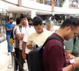 Huge queues for new iPhones as customers wait 12 hours to buy phone