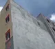 Hyderabad tilted building demolition starts with Bahubali crane in Gopanpally