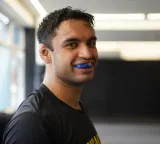 Why did Varun Sanyal pull out of MMA QF at Asian Games?