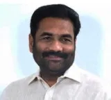 Kotamreddy performs dishti for portraits of Modi Chandrababu and Pawan