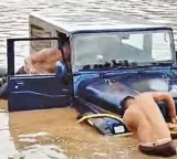 Dharmapuri Youths stuck in flooded pond after sleeping in jeep while drunk