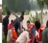 MLA Kuna Ravi Kumar Collector and SP swept away in floods rescued by NDRF