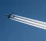 White lines in the path of a plane do you know how they form