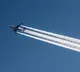 White lines in the path of a plane do you know how they form