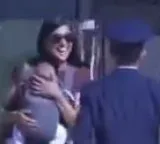 Usha Vance stumbles while getting off helicopter with baby as staff watch