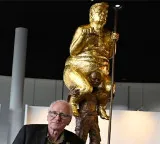 Donald Trump golden naked statue in European Parliament satirical King of Injustice