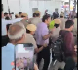 Why are you destroying the country Abhijit Dipke faces protest at Delhi Airport