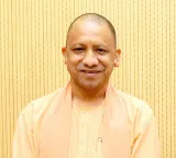 BJP Strategy in UP and Uttarakhand Yogi Adityanath and Pushkar Singh Dhami to Lead Again