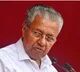 ED pastes notice at former Kerala CM Vijayan house