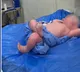 Newborn baby chilling within hours of birth goes viral on social media