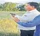 Ex minister Gutta Mohan Reddy warns officials with Gun
