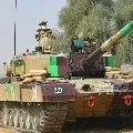 PM Modi travels in a battle tank along with soldiers at Longewala post