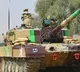 PM Modi travels in a battle tank along with soldiers at Longewala post
