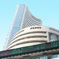 Sensex closes 329 points high