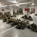 President Biden apologises over troops sleeping in car park