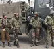 Hizbul terrorists took 12 civilians including children hostage in Baramulla