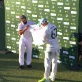 Team India presents a signed jersey to Aussies spinner Nathan Lyon