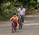 Prakash Raj cycling with his family members at farm house