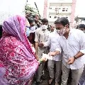 KTR distributes financial help to flood effected poeple