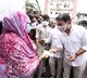 KTR distributes financial help to flood effected poeple