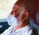 Rajinikanths driving car with a mask