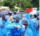 NSUI cadre wearing PPE Kits protests at Pragathi Bhavan