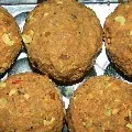 Surpanch candidate in Chittoor dist distributing ladoos to voters