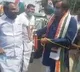 Shashi Tharoor pulls an auto in the protests against petro prices hike