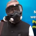 Rajya Sabha MP Narendra Jadhav wears High Efficiency Particulate Air filter mask in Parliament
