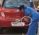 Government Doctor cleaning his car with Saline Bottle