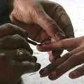 Tirupati Voters get ink mark on right hand in bypolls