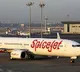 Man tries to open emergency door while plane in midair