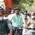 Tamil star hero Vijay arrives by bicycle to cast his vote in Chennai