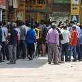 long queues in delhi wine shops