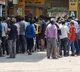 long queues in delhi wine shops