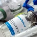 Remediesivir injection bottle filling with water Doctor and compounder arrested