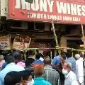 People rushes to wine shops after lock down announcement in Telangana