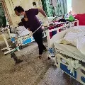 Corona positive Mijoram minister cleans hospital floor