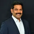 Srungavarapu Niranjan Defeats Naren Kodali