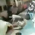 Two Railway Protection Force personnel and a civilian rescue a woman at the Thane Railway Station
