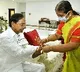 CM KCR sisters ties Rakhis to their beloved younger brother