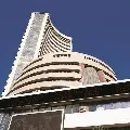 Sensex closes 437 points high