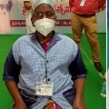 sanitation worker takes first vaccine in ap