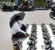 Teacher sells foot wear after schools shut down due to corona pandemic