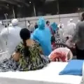Patients perform Garba with health workers at the Nesco COVID19 Center