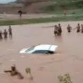 Locals Jump Into River To Save Newlywed Couple In A Half Sunk Car