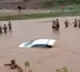 Locals Jump Into River To Save Newlywed Couple In A Half Sunk Car