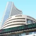 Sensex ends 748 points high