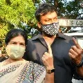 cine political and police officers cast their vote