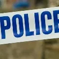 Police welcomes an accused with a garland